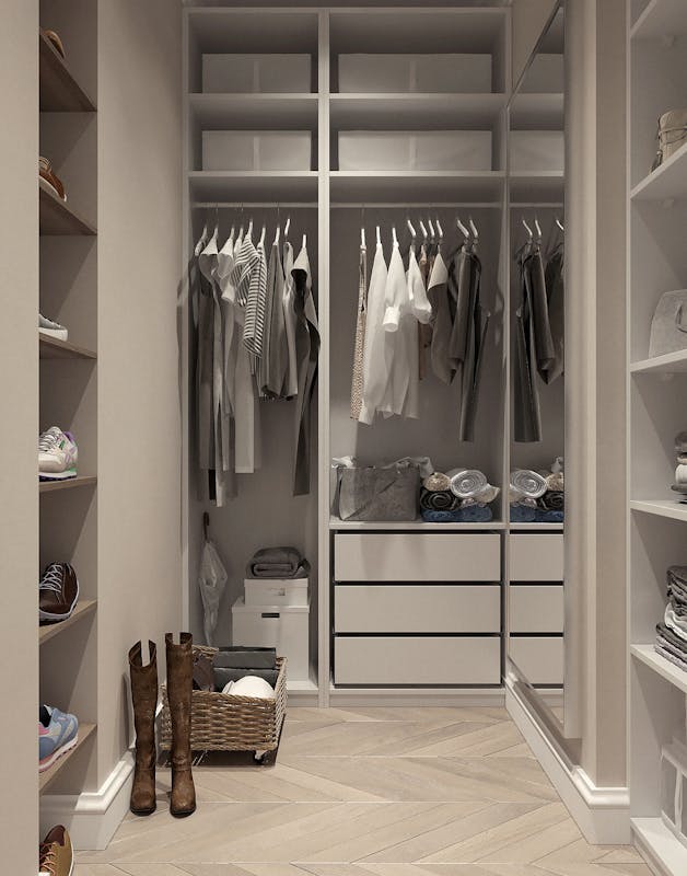 Stylish walk-in closet with neutral tones and contemporary design elements. capsule wardrobe